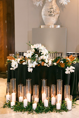 black sweetheart table with candles