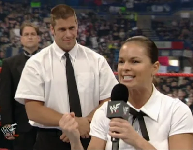 WWE / WWF Rebellion 2000 - Steven Richards looks on proudly as Ivory cuts a promo before her match against Lita