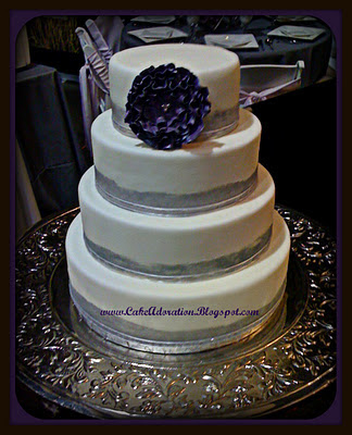 Silver and Eggplant 4 tier fondant cake with shabby chic handmade flower