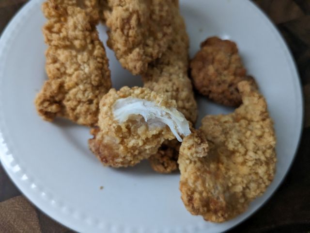 A bag of Tyson Air-Fried Chicken Breast Strips cross-section.