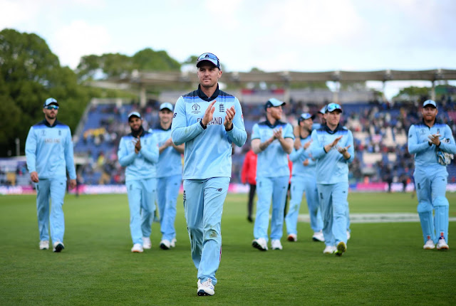 england cricket team celebrating when they win.