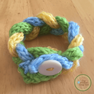 Picture of knitted bracelet done up with the button