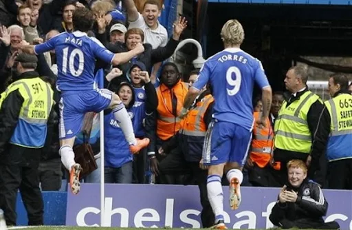 Chelsea player Juan Mata celebrates after scoring the winning goal against Wigan