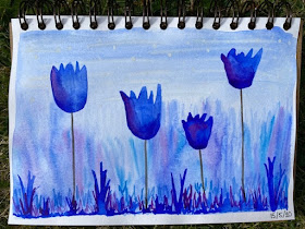 Four blue watercolour tulips with grassy base