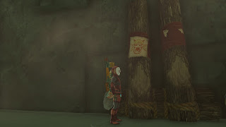 disguised Link standing next to a drawing of a demonic Link by the Yiga