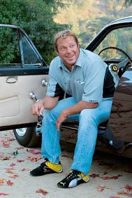 Chad McQueen sitting in his car