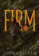 Book cover of The Firm by John Grisham, with the title in large gold letters on a green marble background and a man in a business suit holding a briefcase hanging by puppet strings