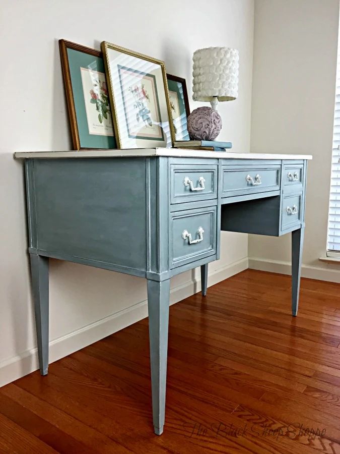 Side view of desk painted in duck egg blue.