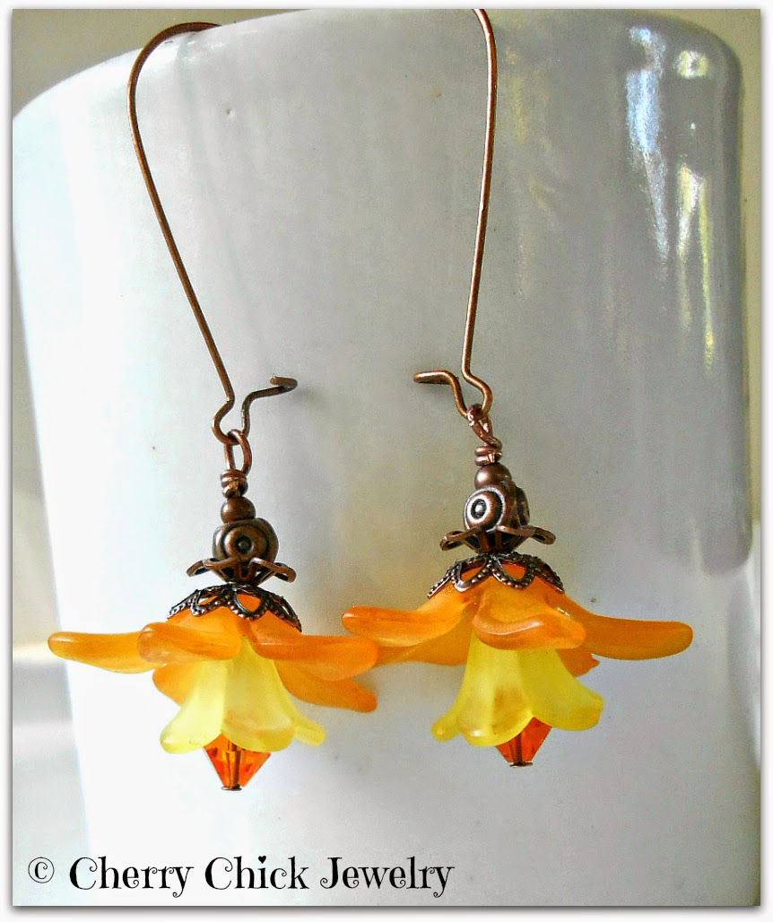 http://www.cherrychickjewelry.com/product/lucite-flower-earrings-orange-dangle-sunshine-yellow-spring