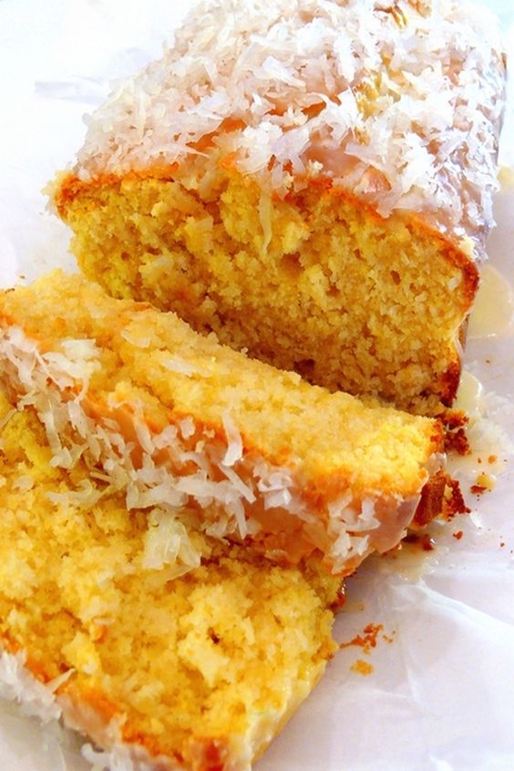 This COCONUT-LEMON LOAF with COCONUT-LEMON GLAZE is the perfect cake. It's exceptionally moist, tender, delicate, and bursting with lemon and coconut flavor from NoblePig.com. #noblepig #lemondessert #coconut #coconutdessert