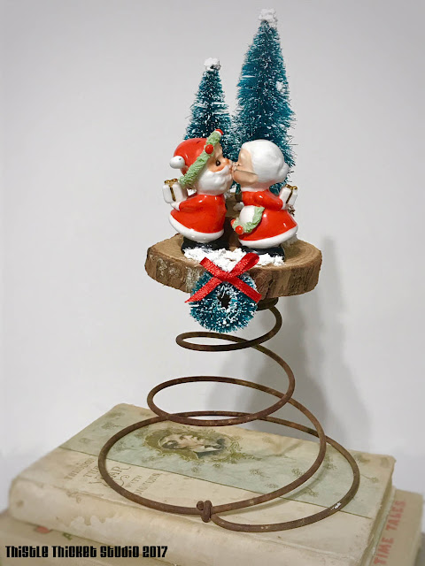 Kissing Claus' Winter Scene on Bedspring by Thistle Thicket Studio. www.thistlethicketstudio.com