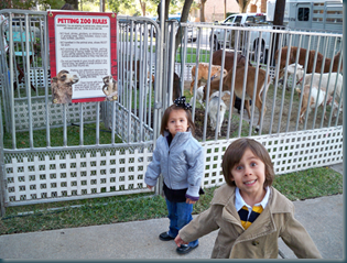 Emily and Jackson and the petting zoo at Harrison's BDay