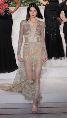 Kendall Jenner shows off her bum in see through dress (photos)