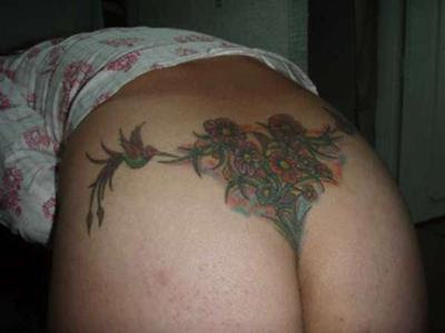 Butterfly and Flower Lower Back Tattoo Design