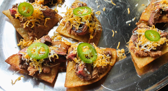 Food Lust People Love: Crunchy fried tortilla triangles topped with refried beans, fajita beef, cheese and jalapeños, these beef fajita nachos compuestos can also be made with store-bought chips. This recipe can also be a main course, as it was for me years ago. You can totally add some shredded lettuce to make you feel better about making this a full meal. 
