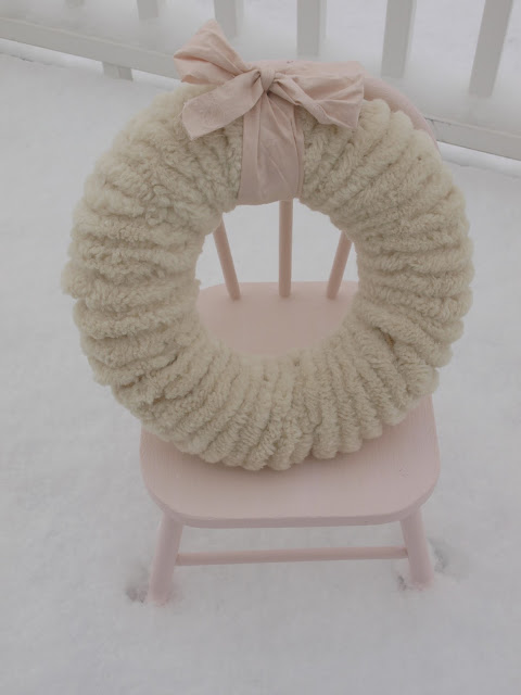 hello-lovely-studio-wolly-pom-pom-wreath-pink-ribbon-chair-snow