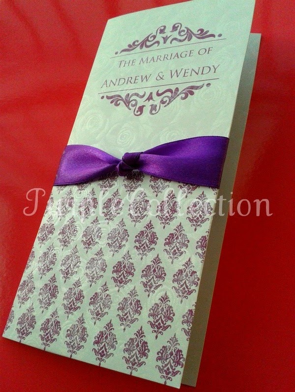 These purple damask floral wedding invitation cards are requested by Wendy