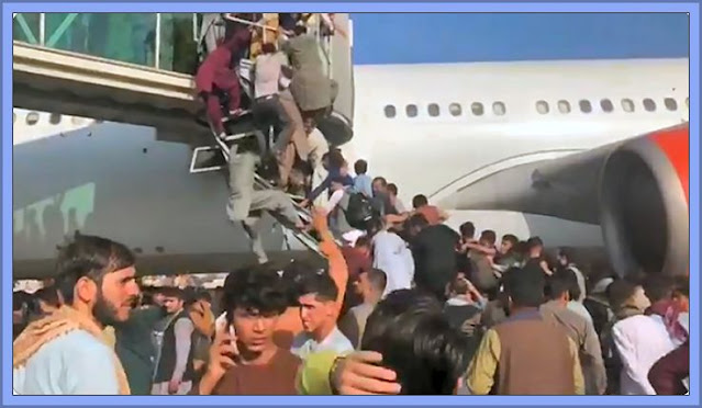 Desperate Afghans Try To Storm A Plane In Kabul