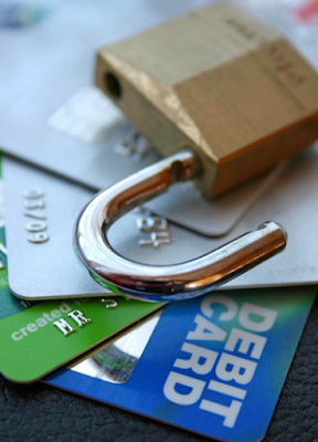 credit cards and open padlock