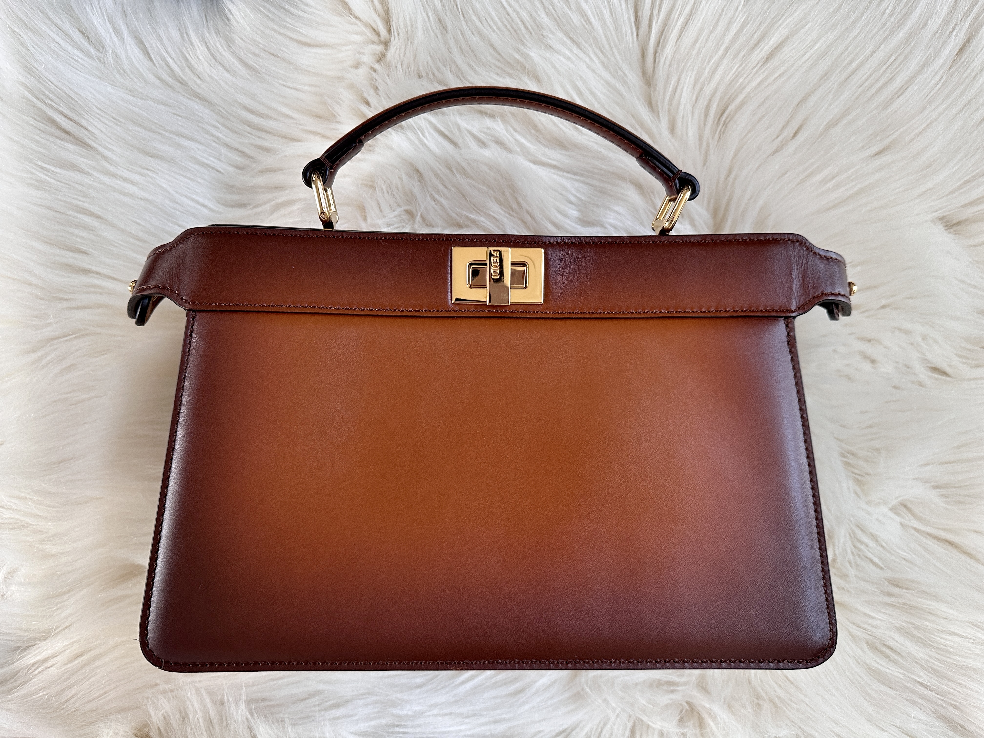 Fendi First bag clutch review. Medium, small- mini, pink, pure, leather,  pure, shearling, python. 