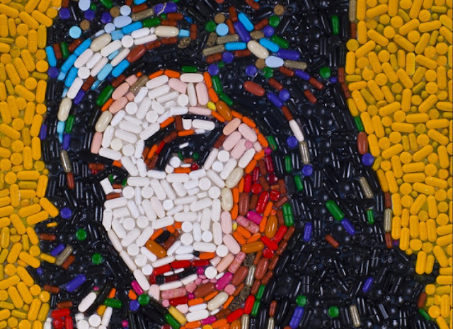 Amy Winehouse portrait made out of 5,000 multi-colored painkillers