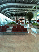 The new wing in Mumbai airport where gates A16 are, is spacious, . (airport )