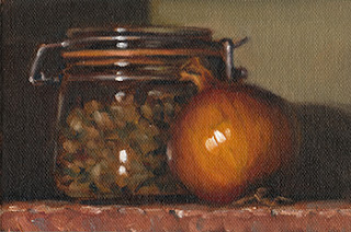 Still life oil painting of a brown onion beside a preserving jar partially filled with pistachios.