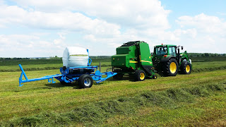 John deere + scorpio bale wrapper