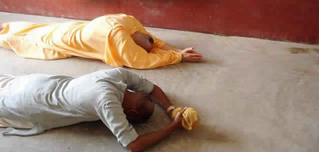 Devotees Bowing Down to Lord Krishna