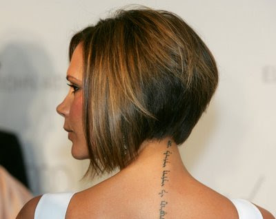  9 her new short do uncovered a tattoo running down the back of her neck 