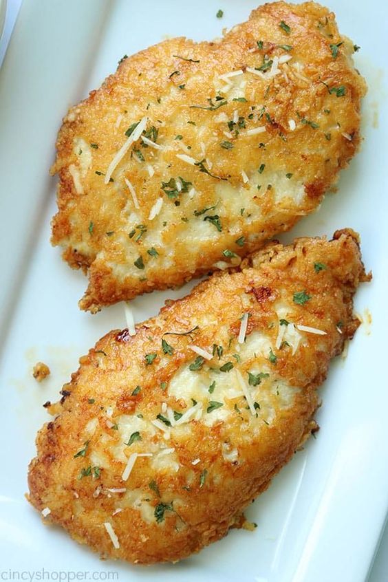 Parmesan Crusted Chicken -We use pounded thin chicken breasts, coat in a delicious Parmesan coating, and then fried to make them crispy.  Add this chicken idea to your dinner this week.