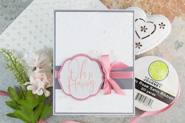 A soft, simple, and pretty card featuring Fun Stampers Journey Spread Love Stamp Set and Mystic Impressions Embossing Folder.  