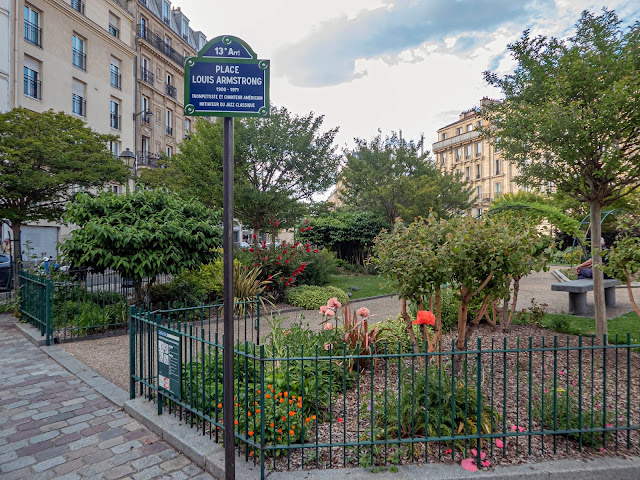 small garden with plants and bench in Paris