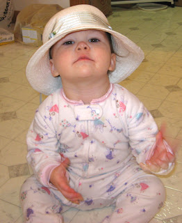 Baby E loves hats
