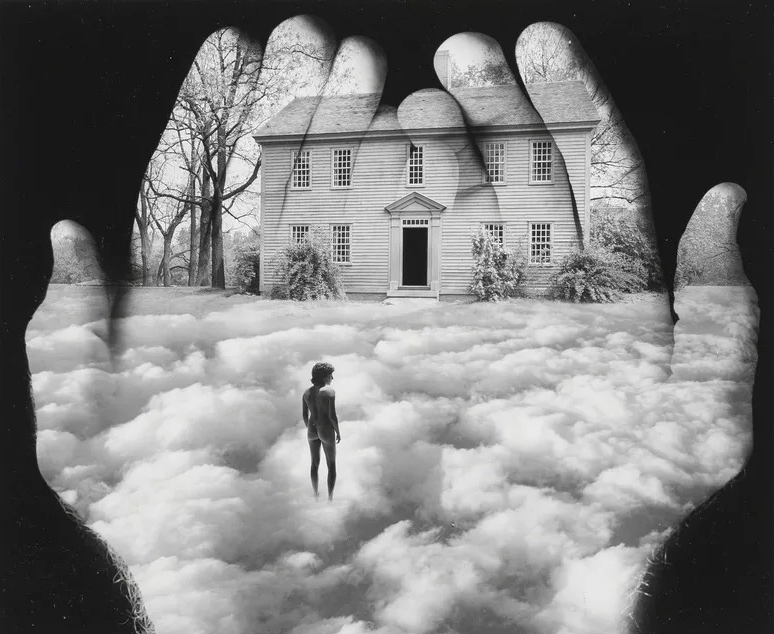 Hands with clouds and house