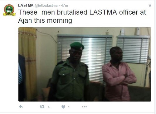 Oh No!!! See How Policeman Humiliated LASTMA Officer in Lagos State (Photos)