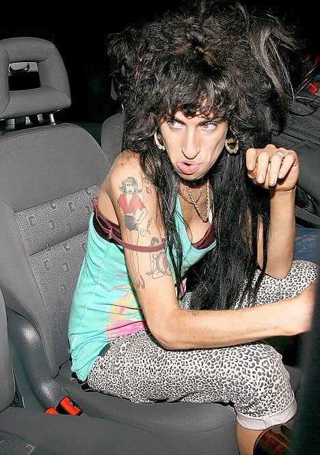 Doesn't Amy Winehouse look like an even worse off version of the great Pauly