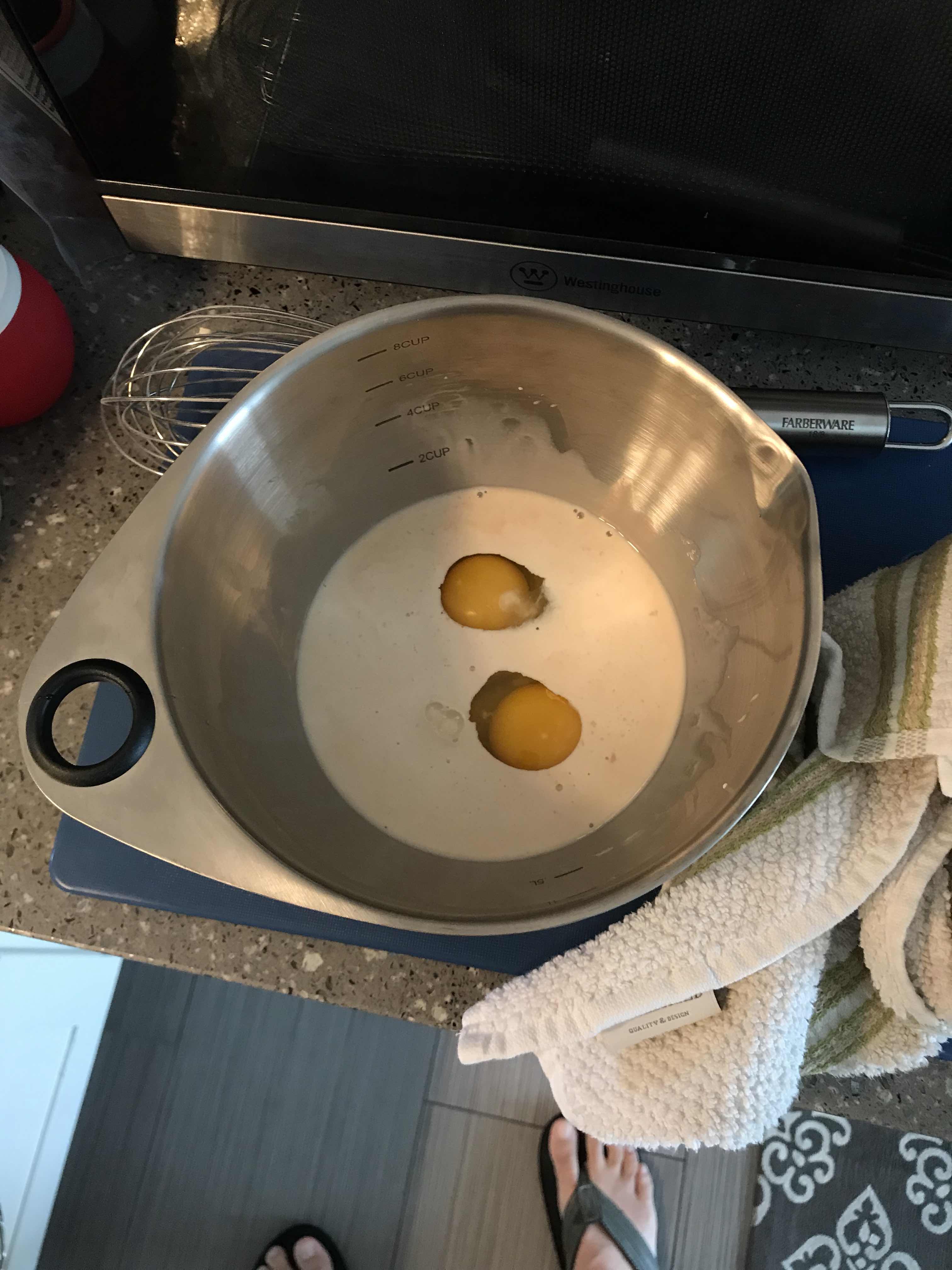 wet ingredients in bowl: eggs and milk