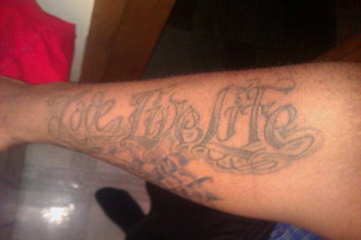 Bustown Inky World Lovelivelife Tattoo On Side Of Forearm