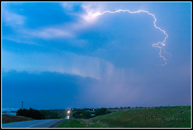 A lightning bolt arcs out across the Nebraska sky