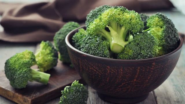 Raw Broccoli In Bowl