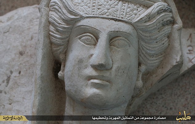 ISIS smashes priceless Palmyra artefacts