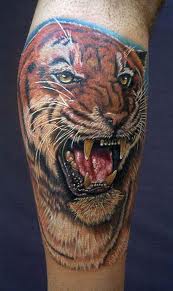http://allaboutbodyart.blogspot.com/ - Tiger_Tattoo_leg_tattoo_design_japanese_tattoo