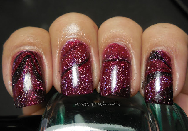 L.A. Girl 3D Holographic in Sparkle Ruby, Purple Effect and Black Illusion