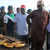 PHOTO: Governor Fashola Buying 'Boli' (Roasted Plantain)