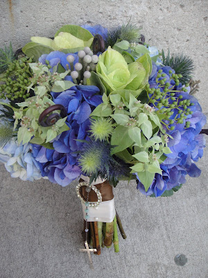Wedding 1 was centered around blue hydrangea The bride's bouquet was