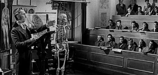 Peter Cushing as Dr. Knox lecturing in The Flesh and the Fiends, 1960