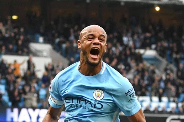 Vincent Kompany gives Man City much needed victory to keep title hopes alive
