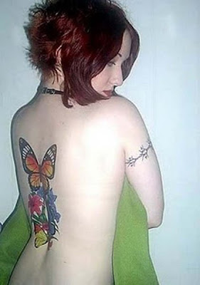 cute,celebrities,cool, tattoos,female, lowerback,lettering,male,girls,tribal,Female Butterfly Tattoo