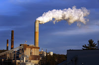 The coal-fired Merrimack Station in Bow, N.H. (Credit: Jim Cole/Associated Press) Click to Enlarge.